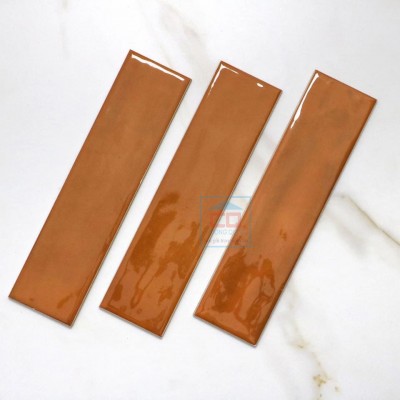 Gạch thẻ 75x300 mm cam nâu M7532P9